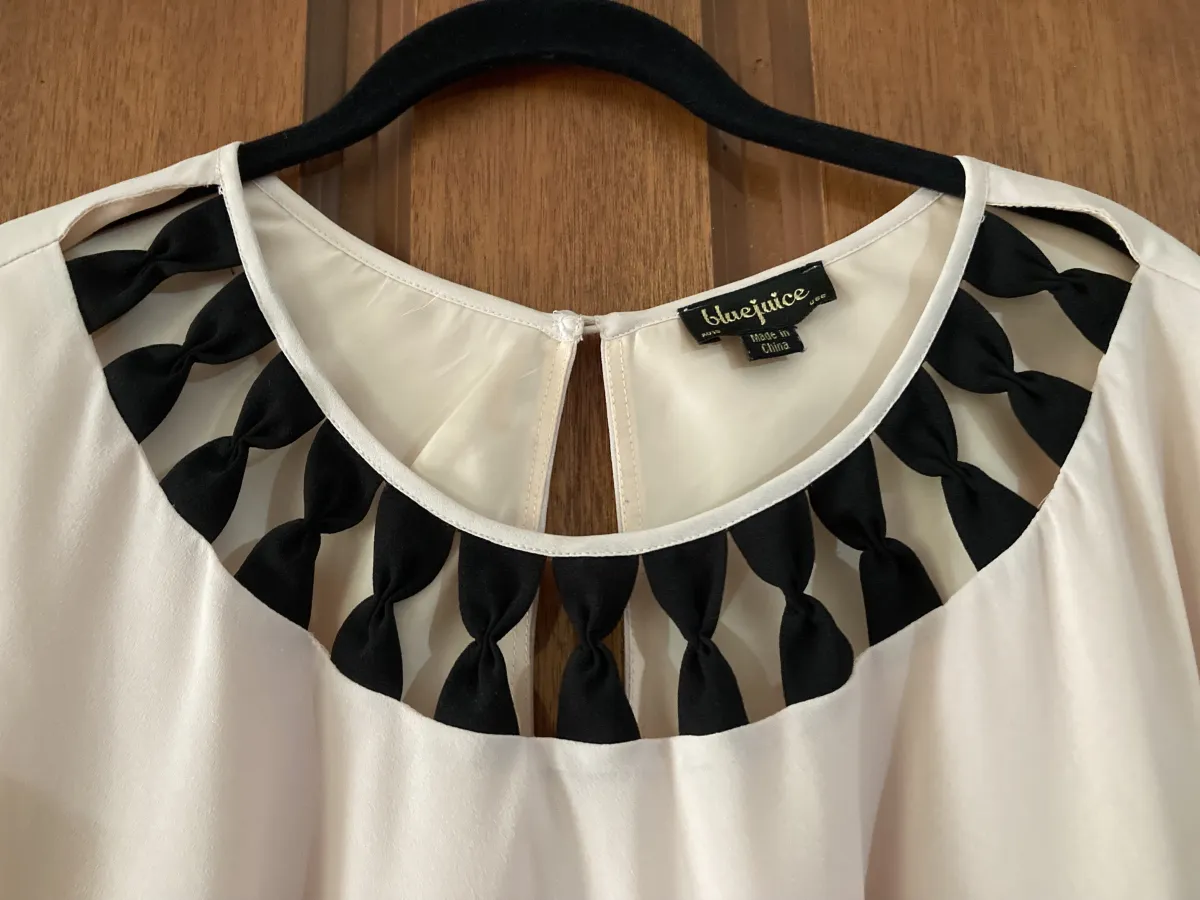 Bluejuice pale pink top with black bow neck detail. Size 10 - Photo 2 of 5